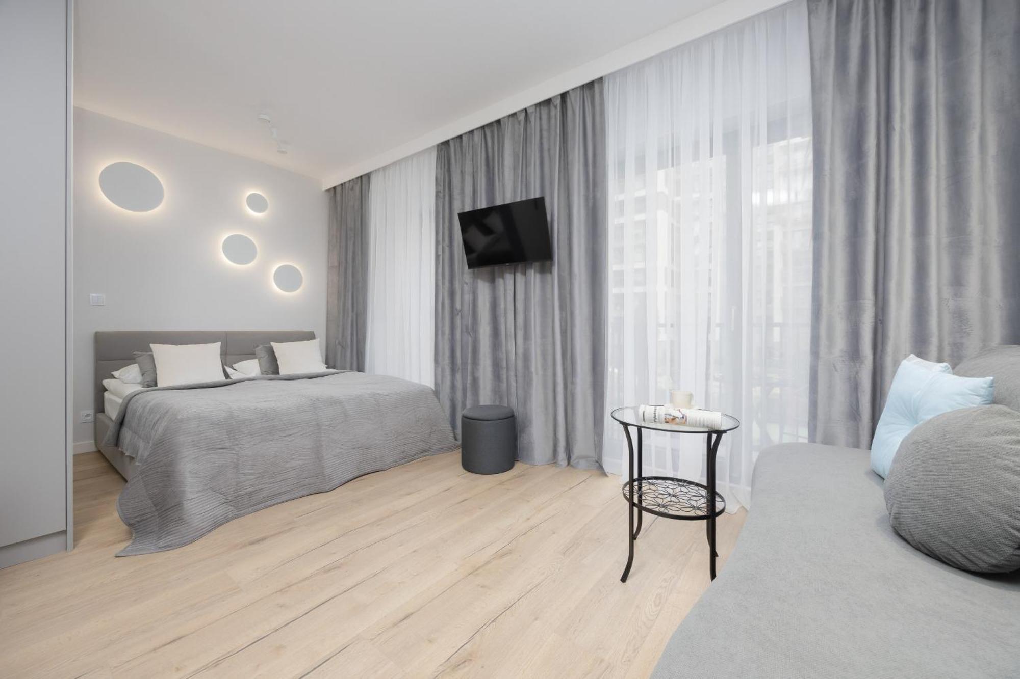 Апартаменти Wyjatkowe Studia W Warszawie By Renters Варшава